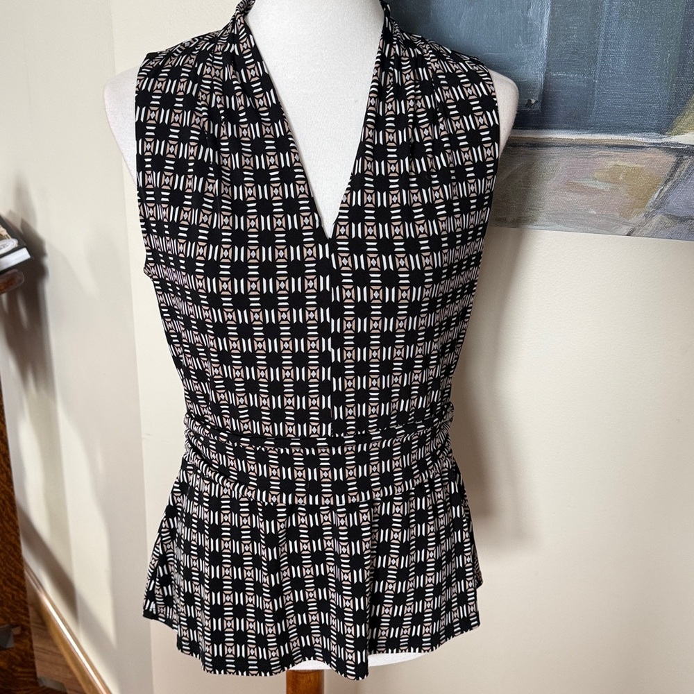 Woman’s White House Black Market, top size medium.